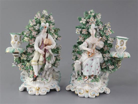 A pair of Derby candlestick groups of musicians, c.1770, height 21.5cm, minor faults